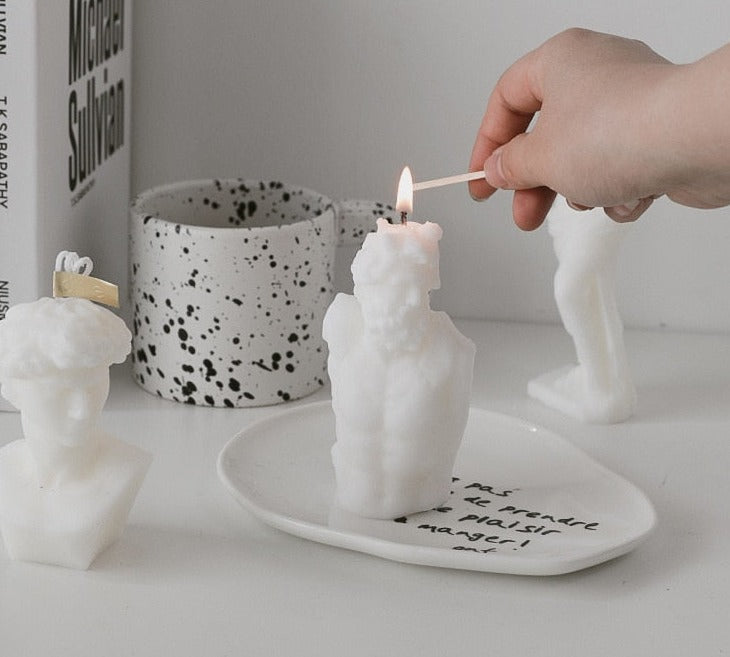 Man In Sculpture Candle