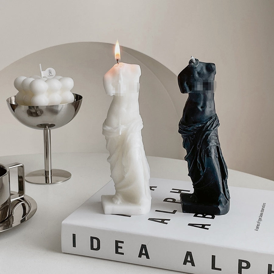 Man In Sculpture Candle